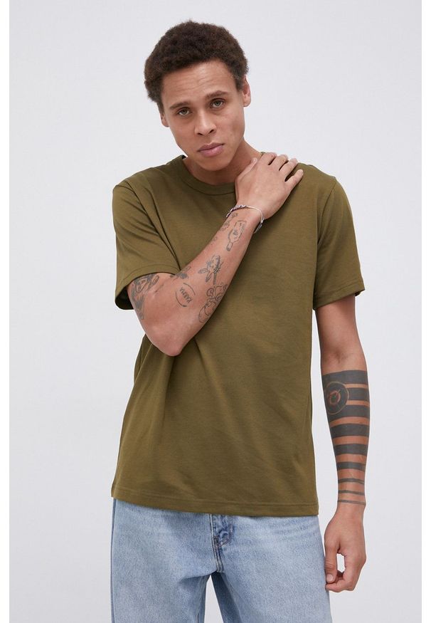 Champion - T-shirt bawełniany. Okazja: na co dzień. Kolor: zielony. Materiał: bawełna. Wzór: gładki. Styl: casual
