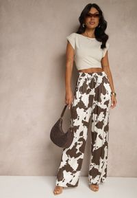 Renee - Brązowe Szerokie Spodnie High Waist z Wiskozy w Print w Krowie Łaty Nelianta. Stan: podwyższony. Kolor: brązowy. Materiał: wiskoza. Wzór: nadruk. Styl: klasyczny, elegancki #5