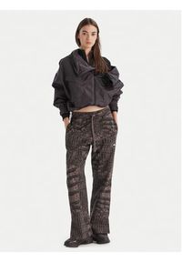 Adidas by Stella McCartney - adidas by Stella McCartney Kurtka przejściowa Item Track Top Printed JV7035 Czarny Loose Fit. Kolor: czarny. Materiał: syntetyk #4