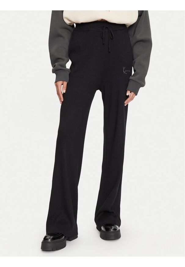 Karl Kani Spodnie dresowe 61030022 Czarny Relaxed Fit. Kolor: czarny. Materiał: syntetyk