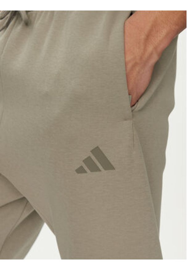 Adidas - adidas Spodnie dresowe Future Icons 3-Stripes JD4862 Beżowy Regular Fit. Kolor: beżowy. Materiał: bawełna, syntetyk
