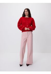 Reserved - Spodnie z paskiem - różowy. Kolor: różowy. Materiał: tkanina #1