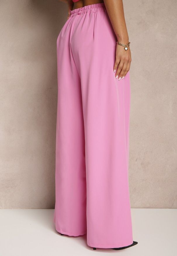 Renee - Różowe Spodnie Garniturowe o Szerokim Kroju High Waist Peavelle. Stan: podwyższony. Kolor: różowy. Styl: klasyczny, elegancki