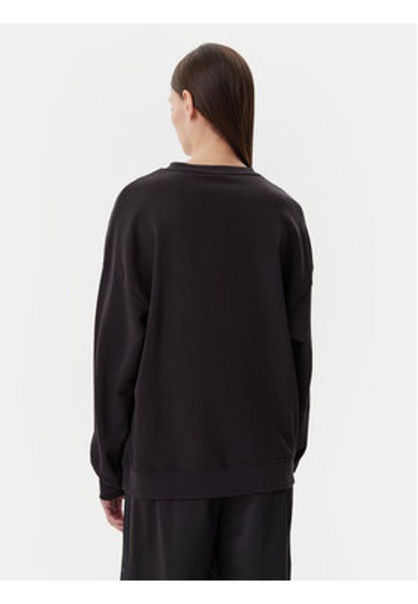 Puma Bluza Ess 685401 Czarny Oversize. Kolor: czarny. Materiał: bawełna