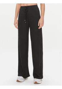 Guess Spodnie piżamowe O3BB01 KBXB2 Czarny Relaxed Fit. Kolor: czarny. Materiał: syntetyk #1