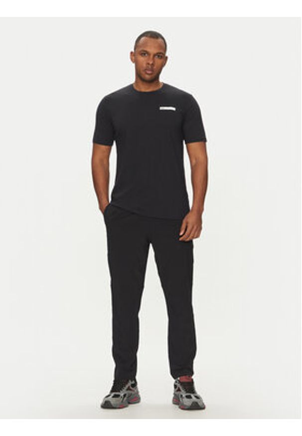 Under Armour T-Shirt Strip Logo 1390203 Czarny Relaxed Fit. Kolor: czarny. Materiał: bawełna, syntetyk