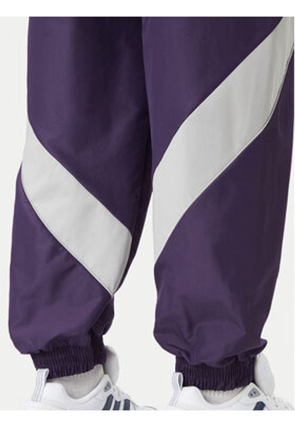 Adidas - adidas Spodnie dresowe Stadium JX5610 Fioletowy Loose Fit. Kolor: fioletowy. Materiał: syntetyk