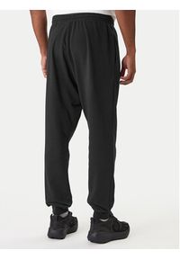 Adidas - adidas Spodnie dresowe Essentials Feel Cozy JE3854 Czarny Regular Fit. Kolor: czarny. Materiał: bawełna #3