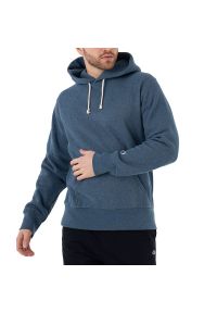 Bluza Champion Hooded Sweatshirt 218800-BM513 - granatowa. Typ kołnierza: kaptur. Kolor: niebieski. Materiał: poliester, bawełna, tkanina. Wzór: aplikacja. Styl: klasyczny, sportowy #1