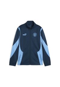 Puma - Młodzieżowa kurtka Manchester City ftblNRGY+ PUMA Marine Blue Blazing. Kolor: niebieski. Wzór: aplikacja. Sport: piłka nożna