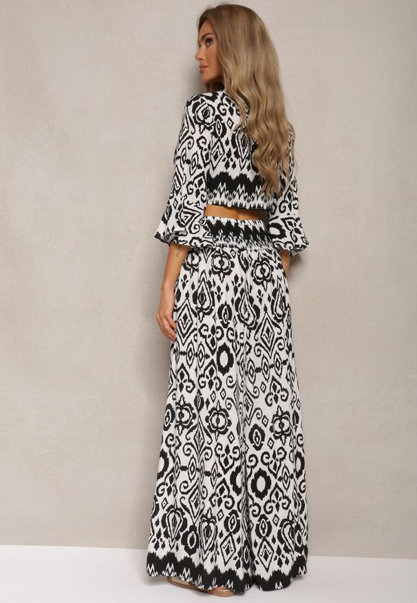 Renee - Czarno-Biały Komplet Krótka Bluzka Kopertowy Wiązany pod Biustem Szerokie Spodnie z Gumką w Talii Viknelas. Kolor: czarny. Materiał: bawełna, materiał