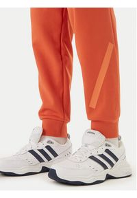 Adidas - adidas Spodnie dresowe Z.N.E. KE4686 Pomarańczowy Regular Fit. Kolor: pomarańczowy. Materiał: bawełna #5