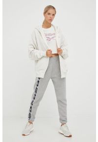 Reebok spodnie dresowe damskie kolor szary gładkie. Kolor: szary. Materiał: dresówka. Wzór: gładki #4
