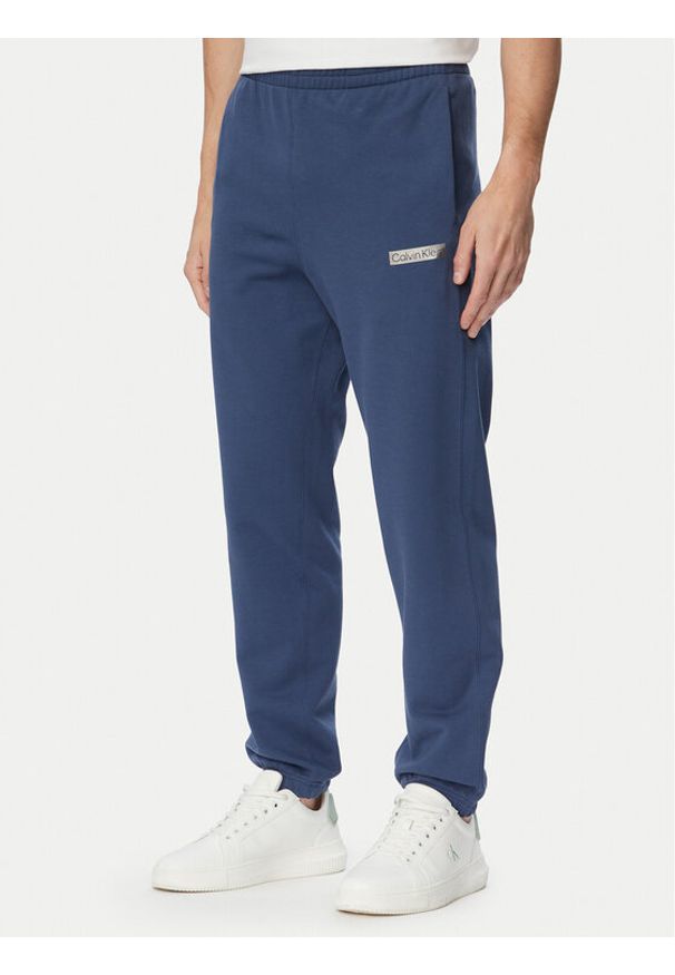 Calvin Klein Spodnie dresowe LV04LG212G Granatowy Regular Fit. Kolor: niebieski. Materiał: bawełna