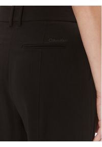 Calvin Klein Spodnie materiałowe K20K205689 Czarny Relaxed Fit. Kolor: czarny. Materiał: syntetyk