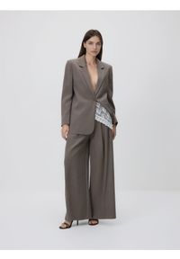 Reserved - Spodnie z wiskozą - beżowy. Kolor: beżowy. Materiał: wiskoza #1