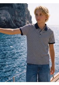 Big-Star - Koszulka chłopięca polo w paski granatowa Fiker 403. Typ kołnierza: polo. Kolor: niebieski. Materiał: dzianina. Długość rękawa: krótki rękaw. Długość: krótkie. Wzór: paski. Styl: sportowy, klasyczny #3