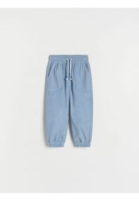 Reserved - Sztruksowe spodnie jogger - niebieski. Kolor: niebieski. Materiał: sztruks #1