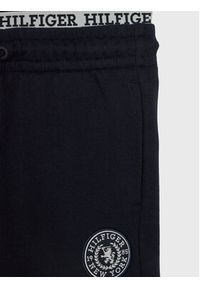 TOMMY HILFIGER - Tommy Hilfiger Spodnie dresowe Crest Logo KB0KB08700 D Granatowy Relaxed Fit. Kolor: niebieski. Materiał: bawełna