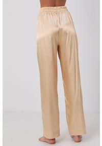 PLNY LALA - Spodnie piżamowe. Kolor: złoty. Materiał: satyna, materiał. Wzór: ze splotem #3