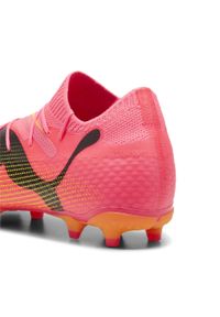 Puma - Buty piłkarskie FUTURE 7 PRO FG/AG PUMA Sunset Glow Black Sun Stream Pink Orange. Kolor: pomarańczowy, czarny, wielokolorowy, żółty. Sport: piłka nożna