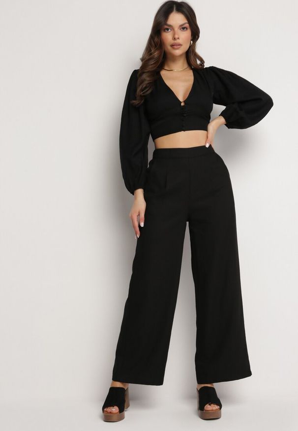 Born2be - Czarne Szerokie Spodnie z Gumką w Talii z Lnem Araniells. Kolor: czarny. Materiał: len. Sezon: lato