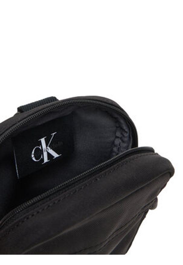 Calvin Klein Saszetka Bold Logo Nylon Slim Reporter LV04D3231G Czarny. Kolor: czarny. Materiał: materiał