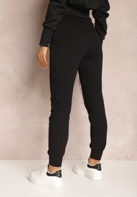 Renee - Czarne Spodnie Dresowe z Łańcuchem Assion. Kolor: czarny. Materiał: dresówka #3