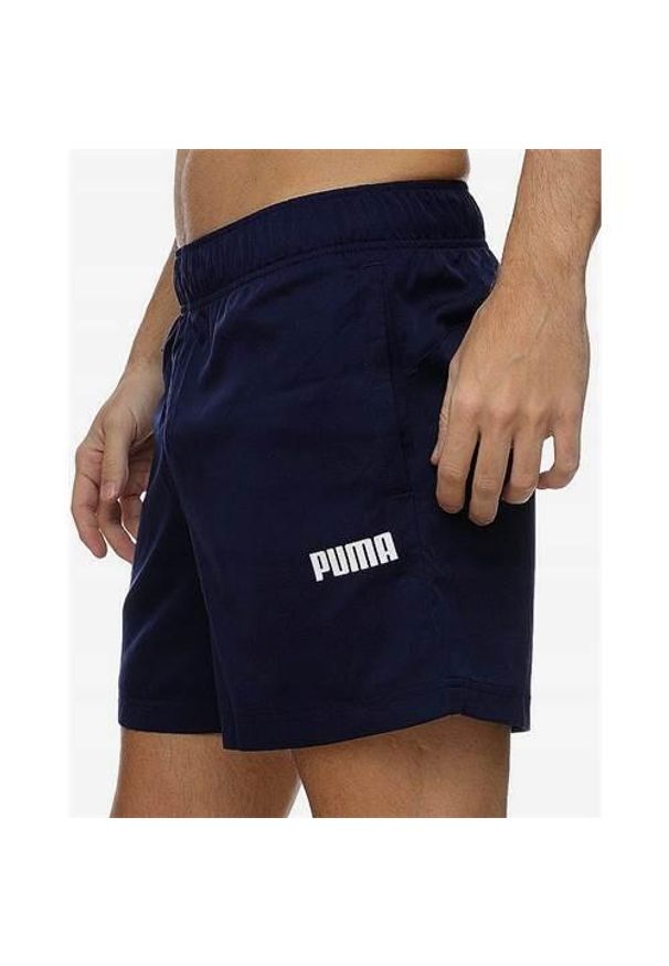 Spodnie sportowe męskie Puma Ess Woven. Kolor: czarny. Długość: krótkie. Styl: sportowy