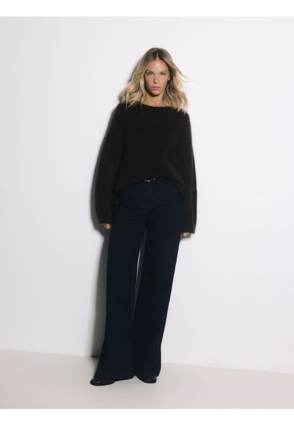 Reserved - Jeansy wide leg z domieszką wełny - granatowy. Kolor: niebieski