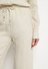 Born2be - Beżowe Szerokie Spodnie z Wiskozy z Wiązaniem w Talii Lilriz. Okazja: na co dzień. Kolor: beżowy. Materiał: wiskoza. Styl: klasyczny, casual, elegancki #7