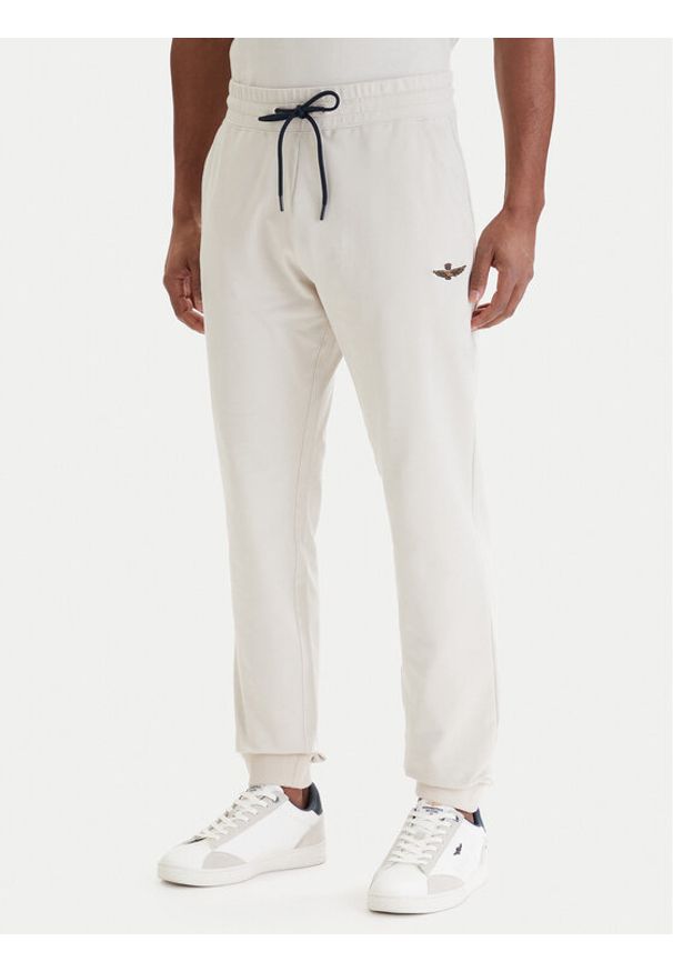 Aeronautica Militare Spodnie dresowe 261PF1008UF00674 Beżowy Regular Fit. Kolor: beżowy. Materiał: bawełna