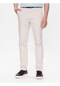 Calvin Klein Chinosy Modern Twill K10K110979 Beżowy Slim Fit. Kolor: beżowy. Materiał: bawełna #1