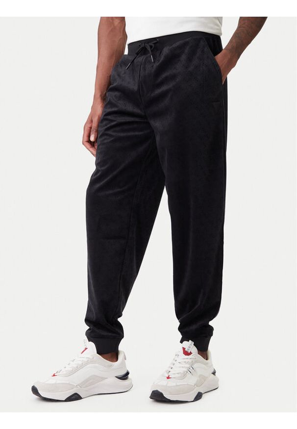 Guess Spodnie dresowe Z6RB14 KD612 Czarny Regular Fit. Kolor: czarny. Materiał: syntetyk