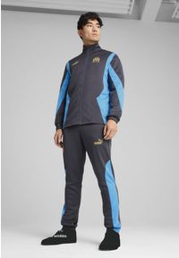 Puma - Męskie spodnie Olympique de Marseille ftblNRGY+ PUMA. Kolor: wielokolorowy, beżowy, szary