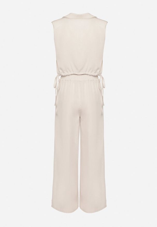 Born2be - Beżowy Komplet Kopertowa Bluzka z Kwiatową Broszką i Szerokie Spodnie Reavilia. Kolor: beżowy. Wzór: kwiaty