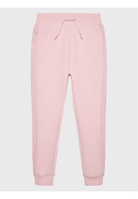 Guess Spodnie dresowe J2YQ24 FL03S Różowy Relaxed Fit. Kolor: różowy. Materiał: bawełna #1