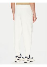 Tommy Jeans Spodnie dresowe Towel Patch DM0DM21277 Écru Regular Fit. Materiał: bawełna