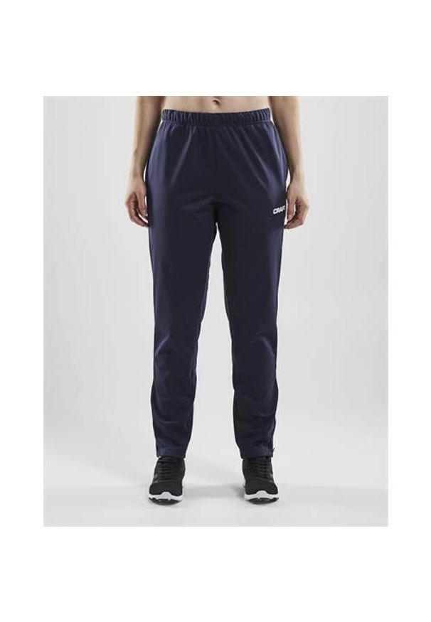 Spodnie damskie Craft squad. Kolor: niebieski. Materiał: syntetyk, materiał. Sport: fitness