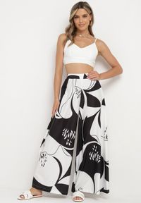 Born2be - Czarno-Białe Wiskozowe Spodnie z Szerokimi Nogawkami i Gumką w Pasie Torria. Okazja: na co dzień. Kolor: czarny. Materiał: wiskoza. Styl: elegancki, casual #5