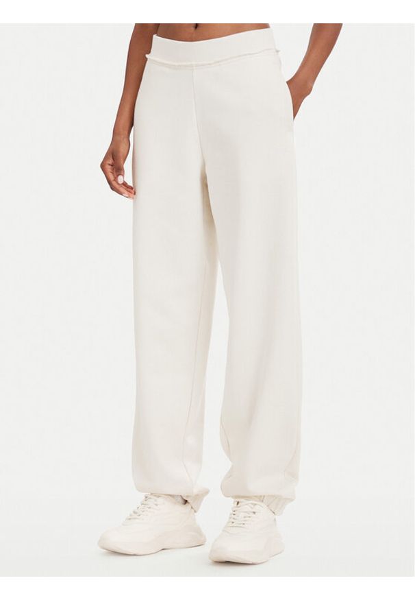 Hugo - HUGO Spodnie dresowe Nuembrie_B 50563984 Kremowy Relaxed Fit. Kolor: kremowy. Materiał: bawełna