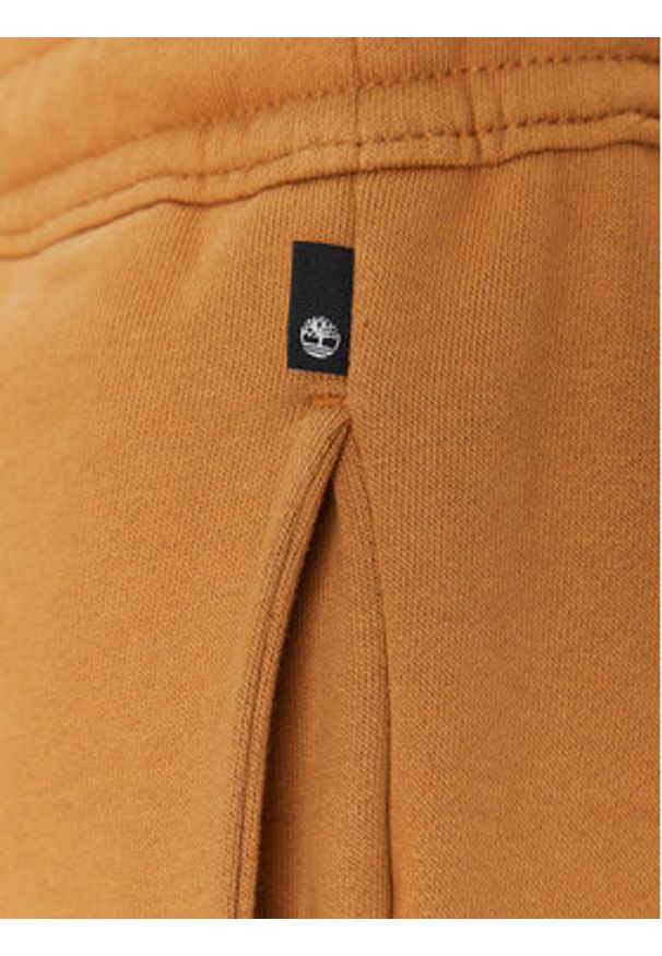 Timberland Spodnie dresowe TB0A5YFB Beżowy Regular Fit. Kolor: beżowy. Materiał: bawełna