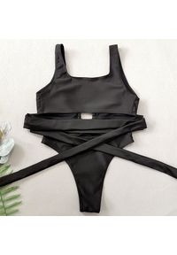 Intica - Strój kąpielowy z ozdobną klamrą elastyczny na plażę i basen G. Kolor: czarny. Materiał: materiał #1