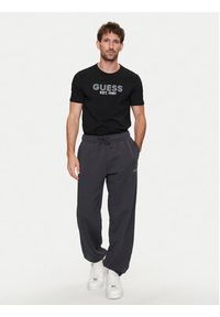Guess T-Shirt M4YI30 J1314 Czarny Slim Fit. Kolor: czarny. Materiał: bawełna