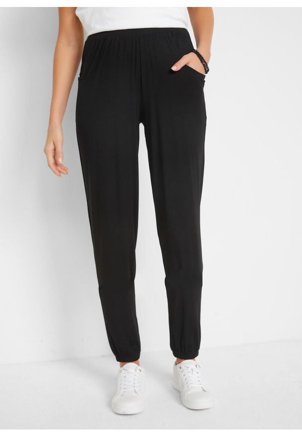 bonprix - Spodnie z dżerseju z wygodnym paskiem. Kolor: czarny. Materiał: jersey