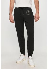 Trussardi Jeans - Spodnie. Kolor: czarny. Materiał: bawełna, dzianina, elastan. Wzór: aplikacja #1