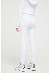 Love Moschino spodnie dresowe kolor biały z nadrukiem. Kolor: biały. Materiał: dresówka. Wzór: nadruk #4