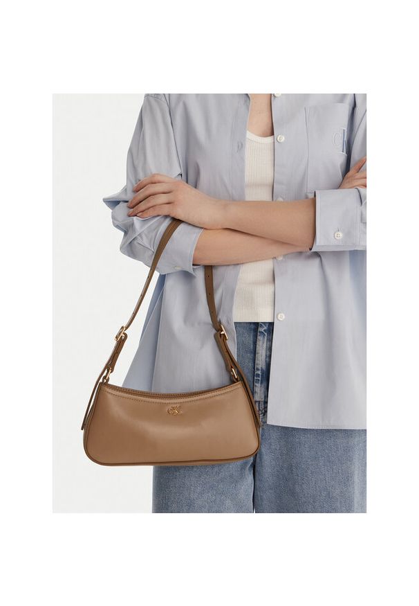 Torebka Calvin Klein. Kolor: beżowy
