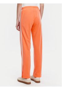 Adidas - adidas Spodnie dresowe adicolor Classics Firebird JC8286 Pomarańczowy Regular Fit. Kolor: pomarańczowy. Materiał: syntetyk #3