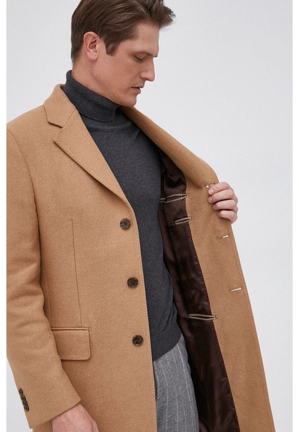 TOMMY HILFIGER - Tommy Hilfiger Płaszcz wełniany kolor beżowy przejściowy. Okazja: na co dzień. Kolor: beżowy. Materiał: wełna. Wzór: gładki. Styl: casual, klasyczny